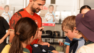 Ugarkovic joins community for Socktober at Wanderers Fives