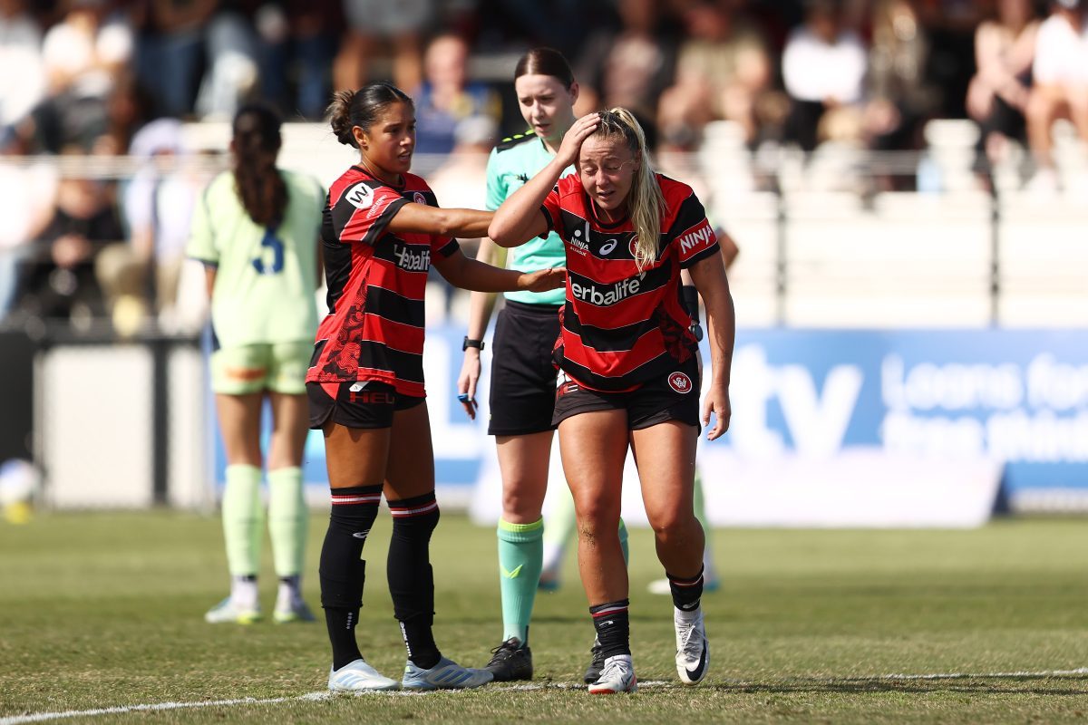 Brooke Miller of the Wanderers reacts after a tackle at Wanderers Football Park.